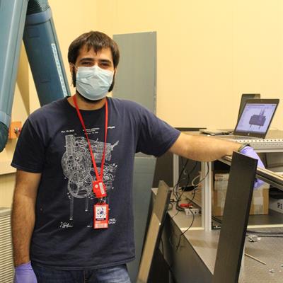 ​PhD student Marco Baruzzo and the laser set up in RIKEN Port 1
