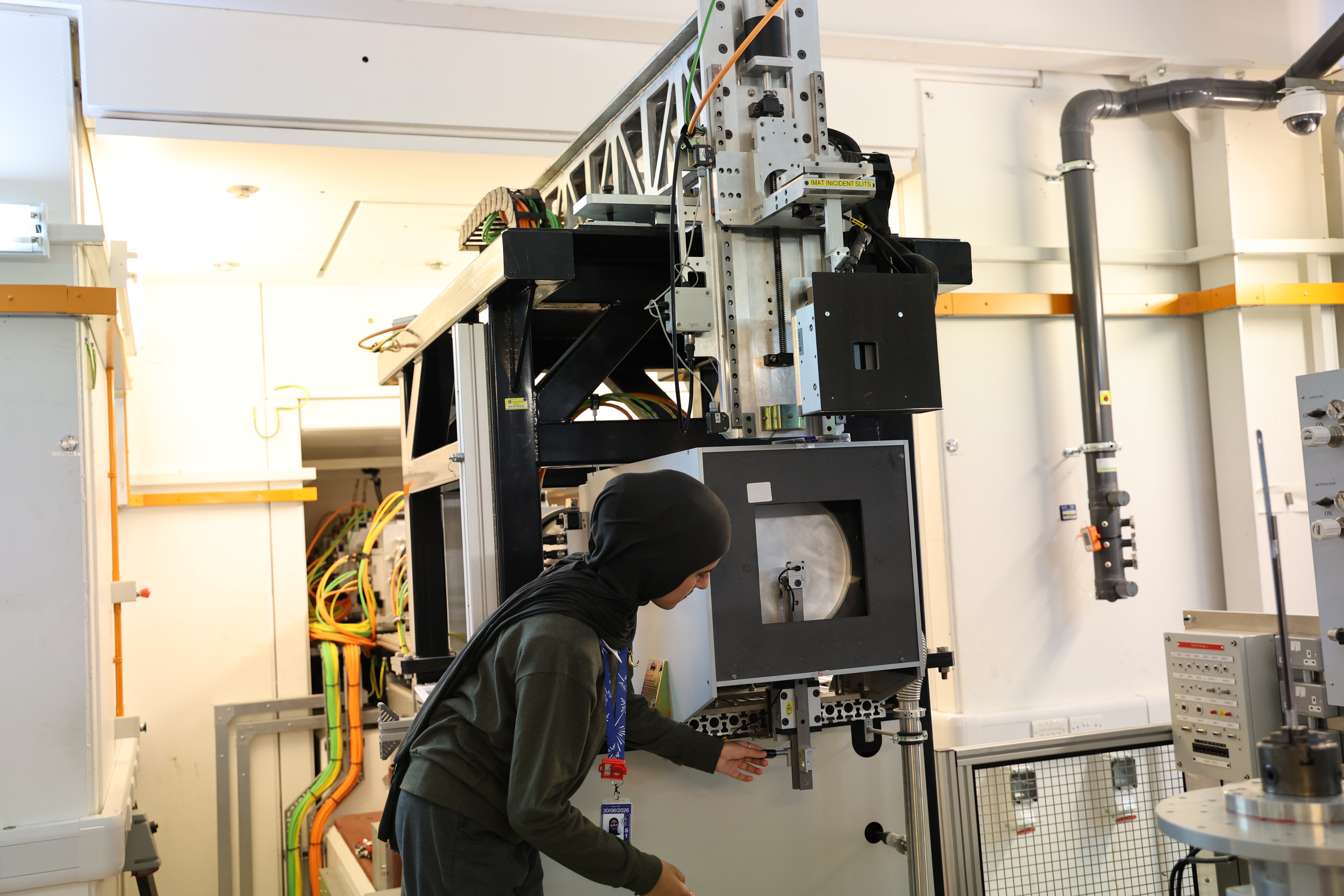 Zuhal working on a machine