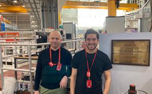 Harry and Mazin standing near the instrument nimrod