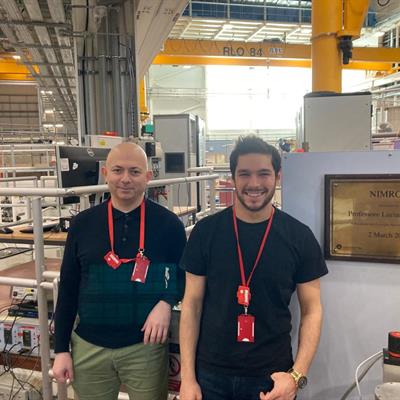 Harry and Mazin standing near the instrument nimrod
