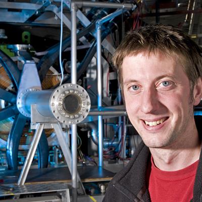 Sean Giblin, muon instrument scientist in front of the Emu muon spectrometrer at ISIS