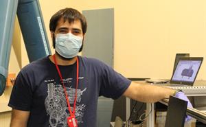 ​PhD student Marco Baruzzo and the laser set up in RIKEN Port 1