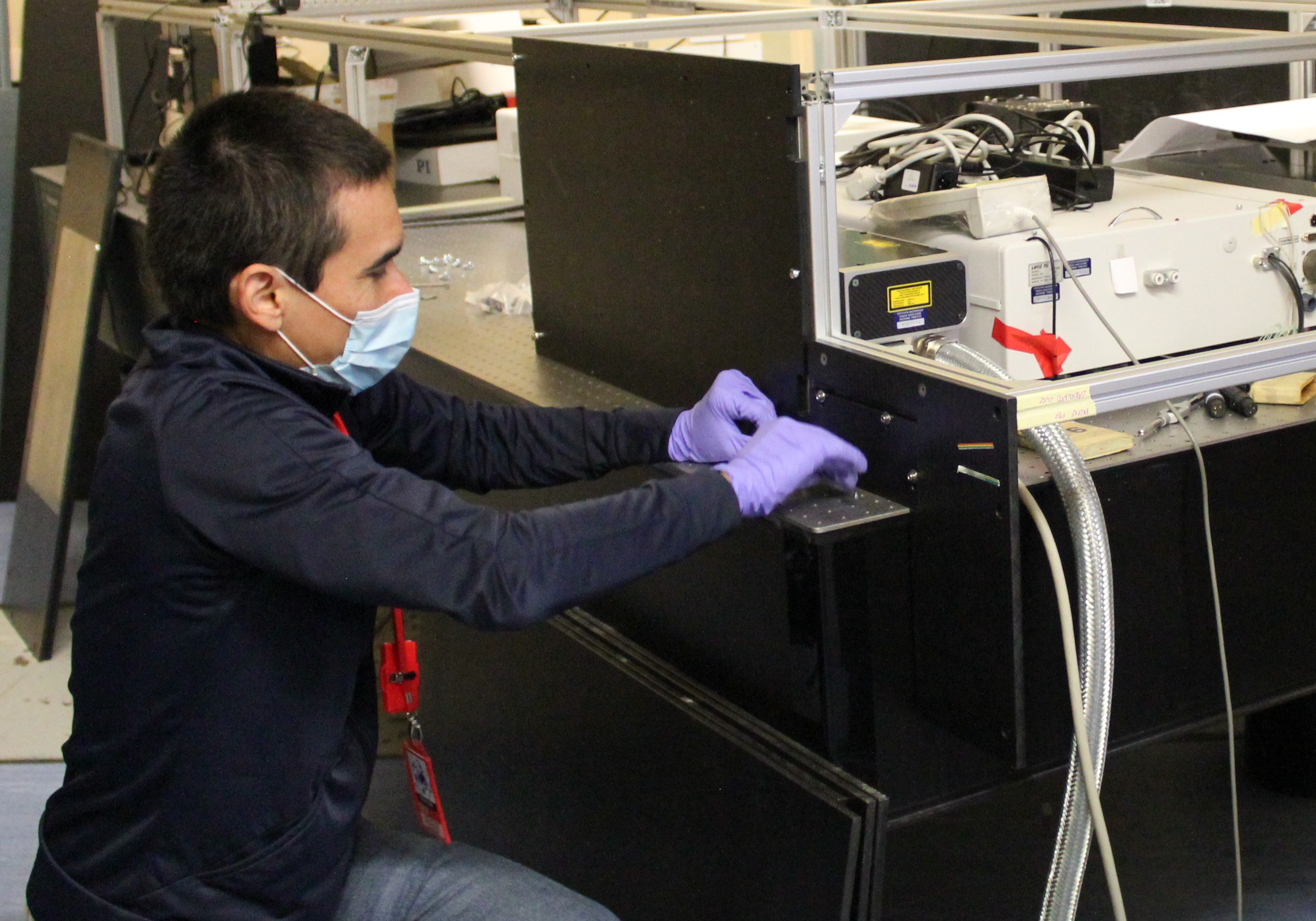 Research Fellow Jose Suarez Vargas setting up the laser in RIKEN Port 1