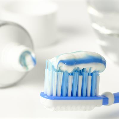 toothpaste on a toothbrush