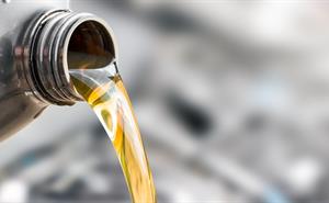 Oil pouring into an engine