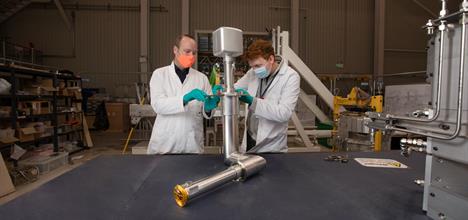 ​​Dan Coates and Harry Sullivan​ working on the new hydrogen moderator