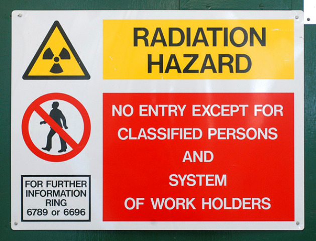 A sign saying "no entry except for classified persons and system of work holders"