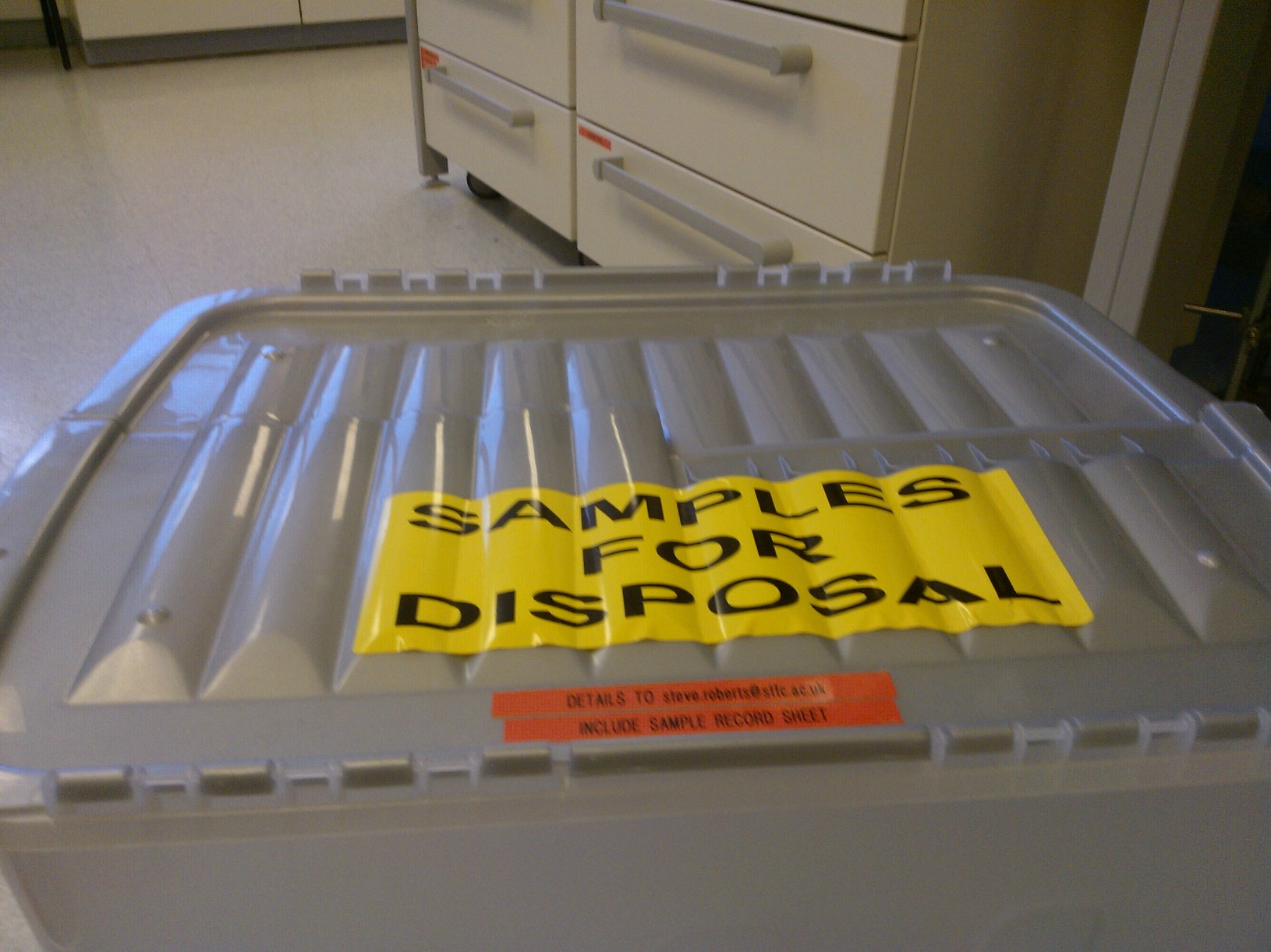Box with "samples for disposal" written on the top