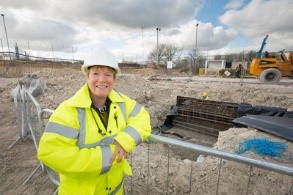 Zoë on the construction site of the new R106 building