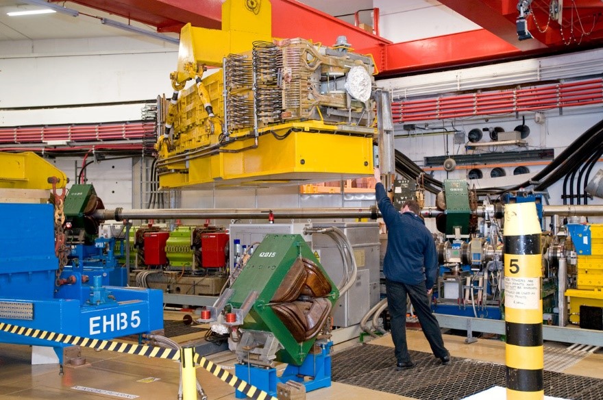 A dipole magnet being lifted into place in the ISIS synchrotron