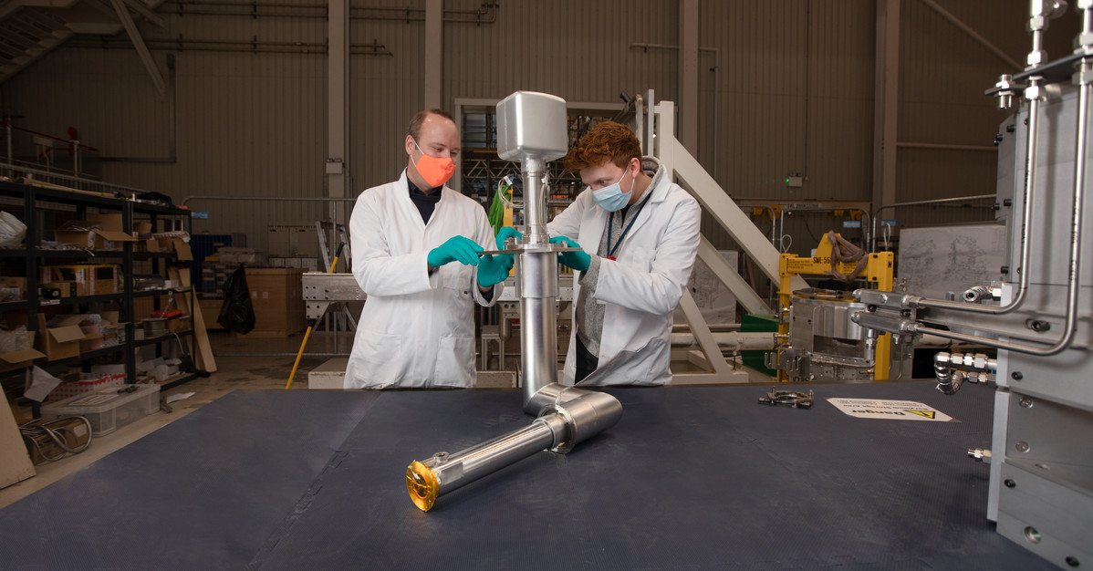 Dan Coates and Harry Sullivan working on the new hydrogen moderator