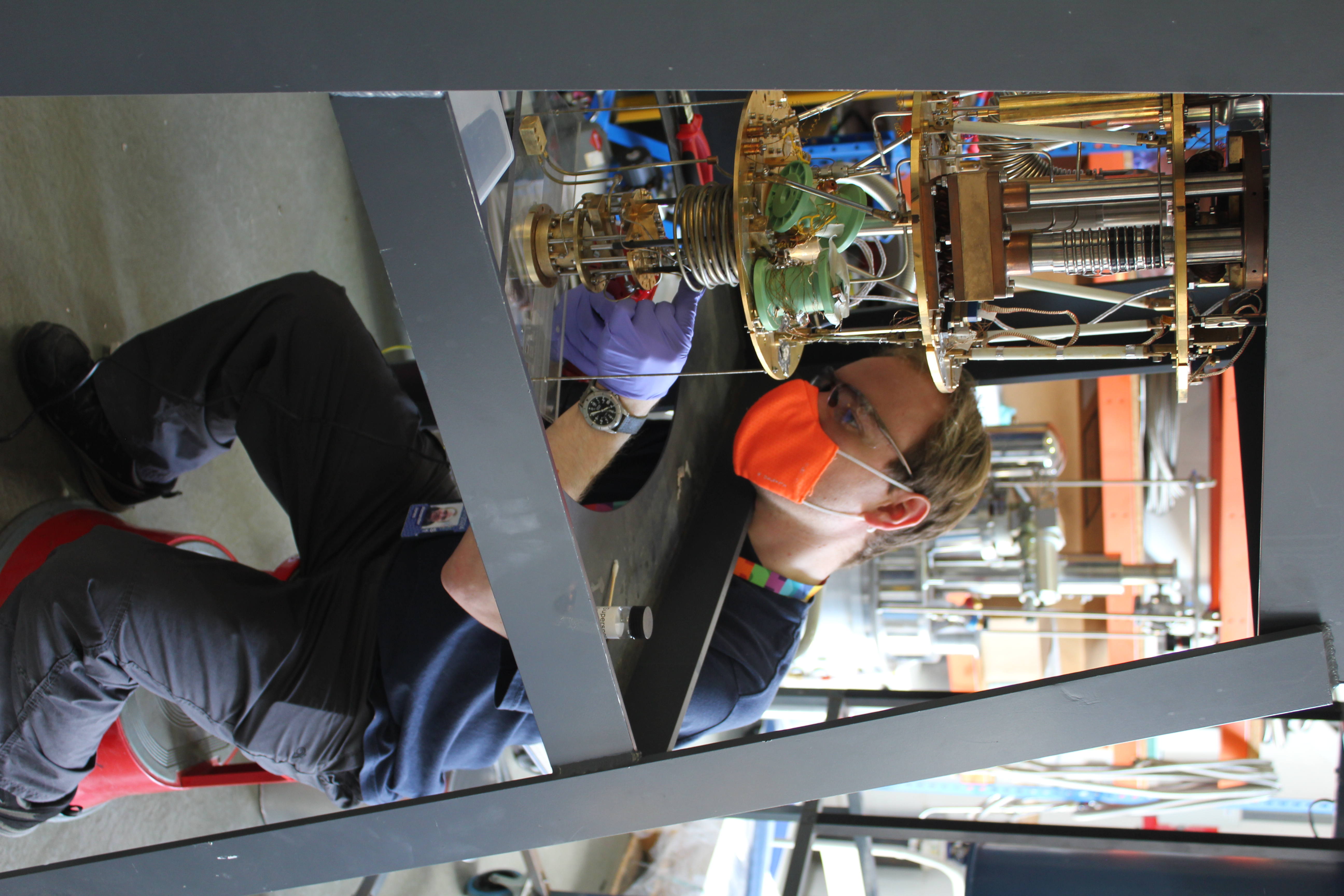 Alex soldering the dilution fridge pipes