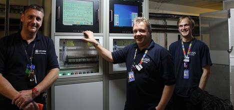 Darren, Mark and Elliot next to the new electronics rack that controls the light curtains.